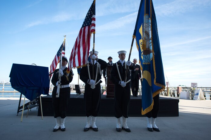 Sailors of the Joint Base Charleston-Weapons Station Honor Guard post the colors during the USS Charleston ship-naming ceremony Jan. 9, 2015 at the Maritime Center in Charleston, S.C. The USS Charleston will be part of the Littoral Combat Ship fleet and is a fast, agile, focused-mission platform designed for operation in near-shore environments and is capable of open-ocean operations. It is designed to defeat asymmetric "anti-access" threats such as mines, quiet diesel submarines and fast surface craft. (U.S. Air Force photo by Tech Sgt. Rasheen Douglas)