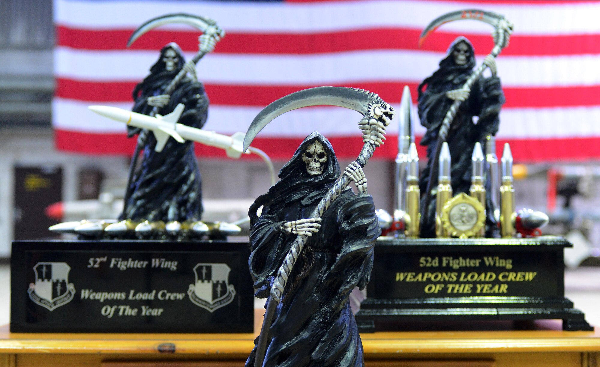 Weapons Load Crew of the Year trophies await the winner of the weapons load competition in Hangar 1 at Spangdahlem Air Base, Germany, Jan. 9, 2015. The winners of the competition will be announced later this month at an awards ceremony. (U.S. Air Force photo by Airman 1st Class Luke Kitterman/Released)  