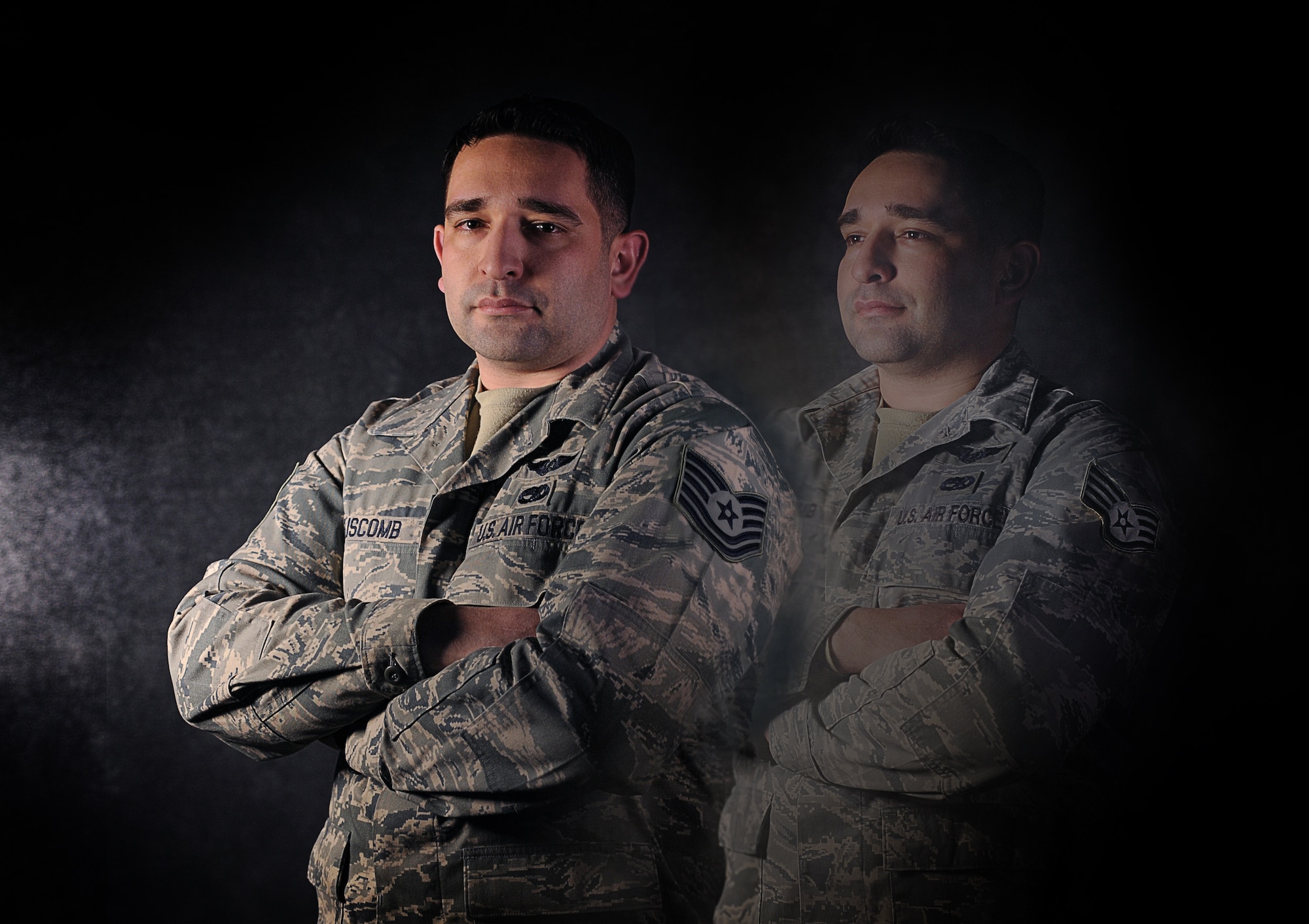 Tech. Sgt. Thomas Liscomb, 54th Helicopter Squadron UH-1N (Huey) evaluator special missions aviator, poses in both his technical sergeant and staff sergeant uniforms for a composite image created on Minot Air Force Base, N.D., Jan. 12, 2015. Liscomb was recently selected as one of only six Airmen to receive a STEP promotion in all of Global Strike Command for 2015. (U.S. Air Force illustration/Senior Airman Stephanie Morris)