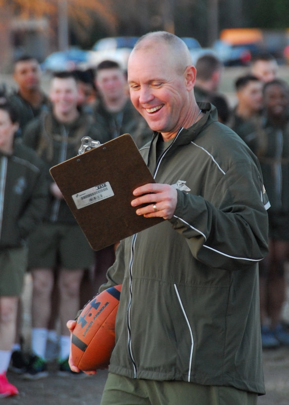 Commanding Officer of MCES, Col Baldwin, announces winner of MCES Punt, Pass and Kick competition, held on January 9th, 2015.