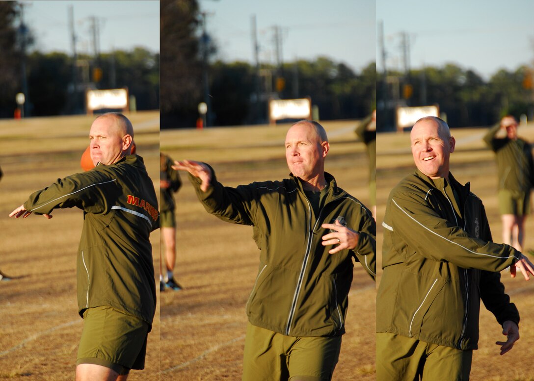 Commanding Officer MCES, Col Baldwin, participates in MCES Punt, Pass and Kick competition.