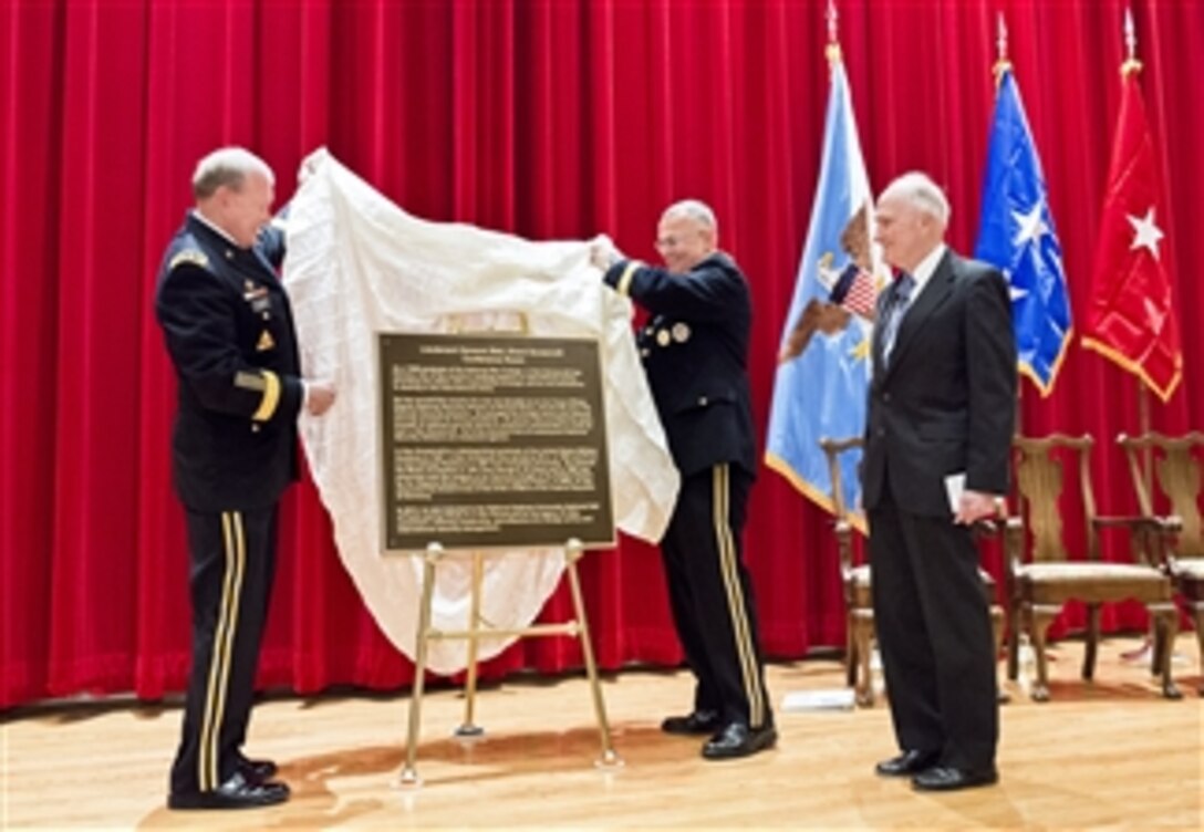Army Gen. Martin E. Dempsey, left, chairman of the Joint Chiefs of Staff, and National War College Commandant Army Brig. Gen. Guy "Tom" Cosentino unveil a door placard to honor retired Air Force Lt. Gen. Brent Scowcroft during a dedication ceremony for Scowcroft at the National Defense University's National War College on Fort McNair in Washington, D.C., Jan. 13, 2015. The university hosted the event to officially dedicate a Roosevelt Hall room to Scowcroft, a former national security advisor.