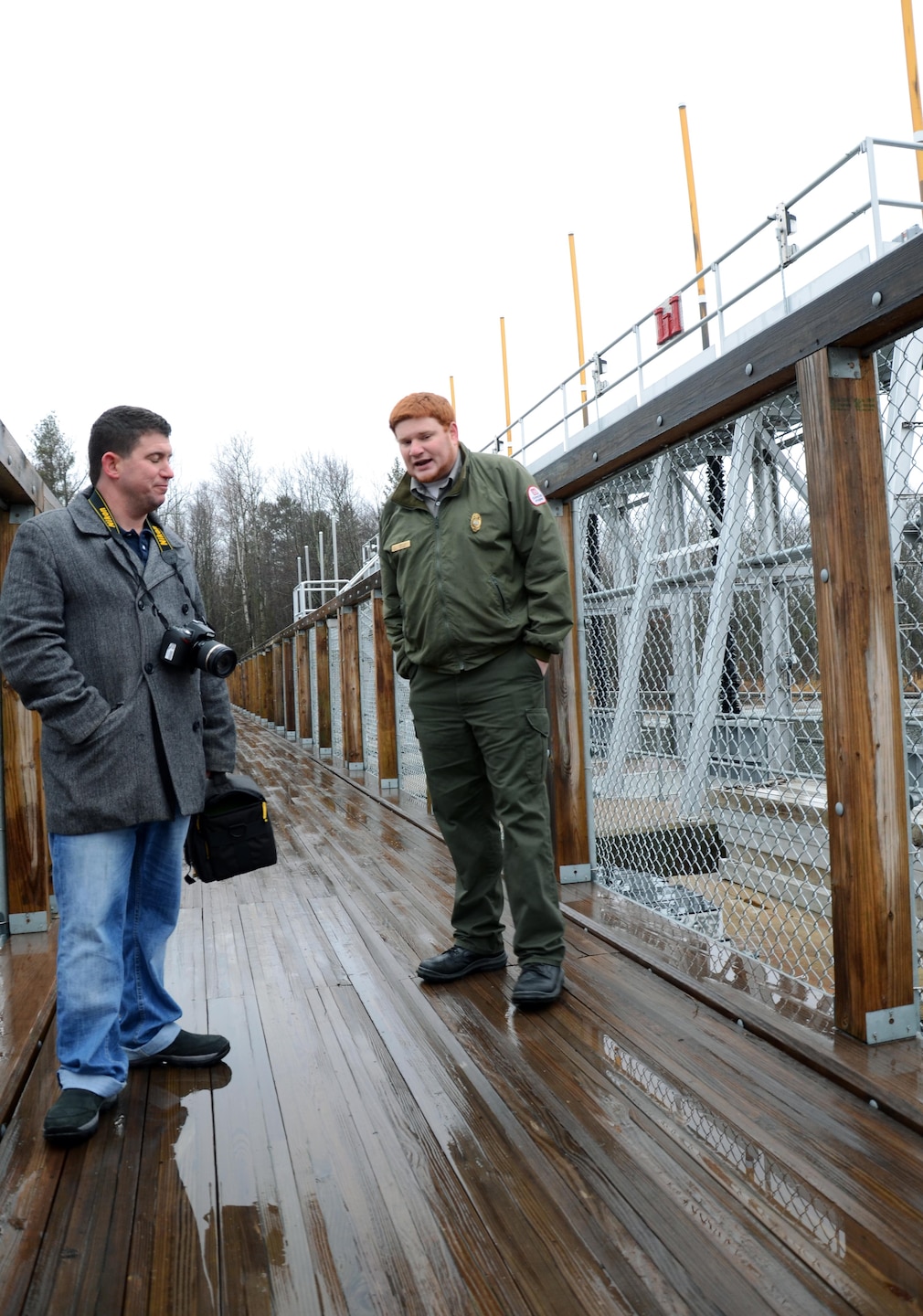 Ben Watson, left, St. Paul District public affairs, talks with Jeff Cook, operations manager for Pokegama Dam Recreation Area and Winnibigoshish Lake, during a recent site visit. 