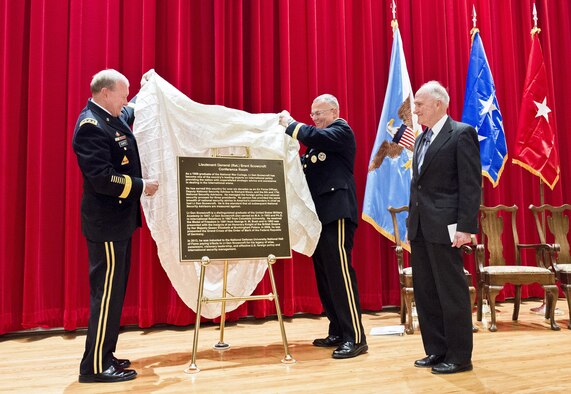 Army Gen. Martin E. Dempsey, left, and Army Brig. Gen. Guy Cosentino unveil a door placard to honor retired Air Force Lt. Gen. Brent Scowcroft during a dedication ceremony for Scowcroft Jan. 13, 2015, at the National Defense University's National War College on Fort Lesley J. McNair in Washington, D.C. The university hosted the event to officially dedicate a Roosevelt Hall room to Scowcroft, a former national security advisor. Dempsey is the chairman of the Joint Chiefs of Staff and Cosentino is the National War College commandant. (DOD photo/Army Staff Sgt. Sean K. Harp)  

