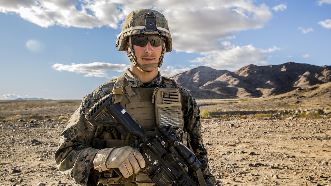 U.S. Marine Lance Cpl. Joseph Burk waits for live-fire training to begin during a combined arms exercise aboard Marine Corps Air Ground Combat Center, Twentynine Palms, Calif., Dec. 13, 2014. Burk is a team leader with Battalion Landing Team 3rd Battalion, 1st Marine Regiment, 15th Marine Expeditionary Unit. (U.S. Marine Corps Photo by Sgt. Emmanuel Ramos/Released)