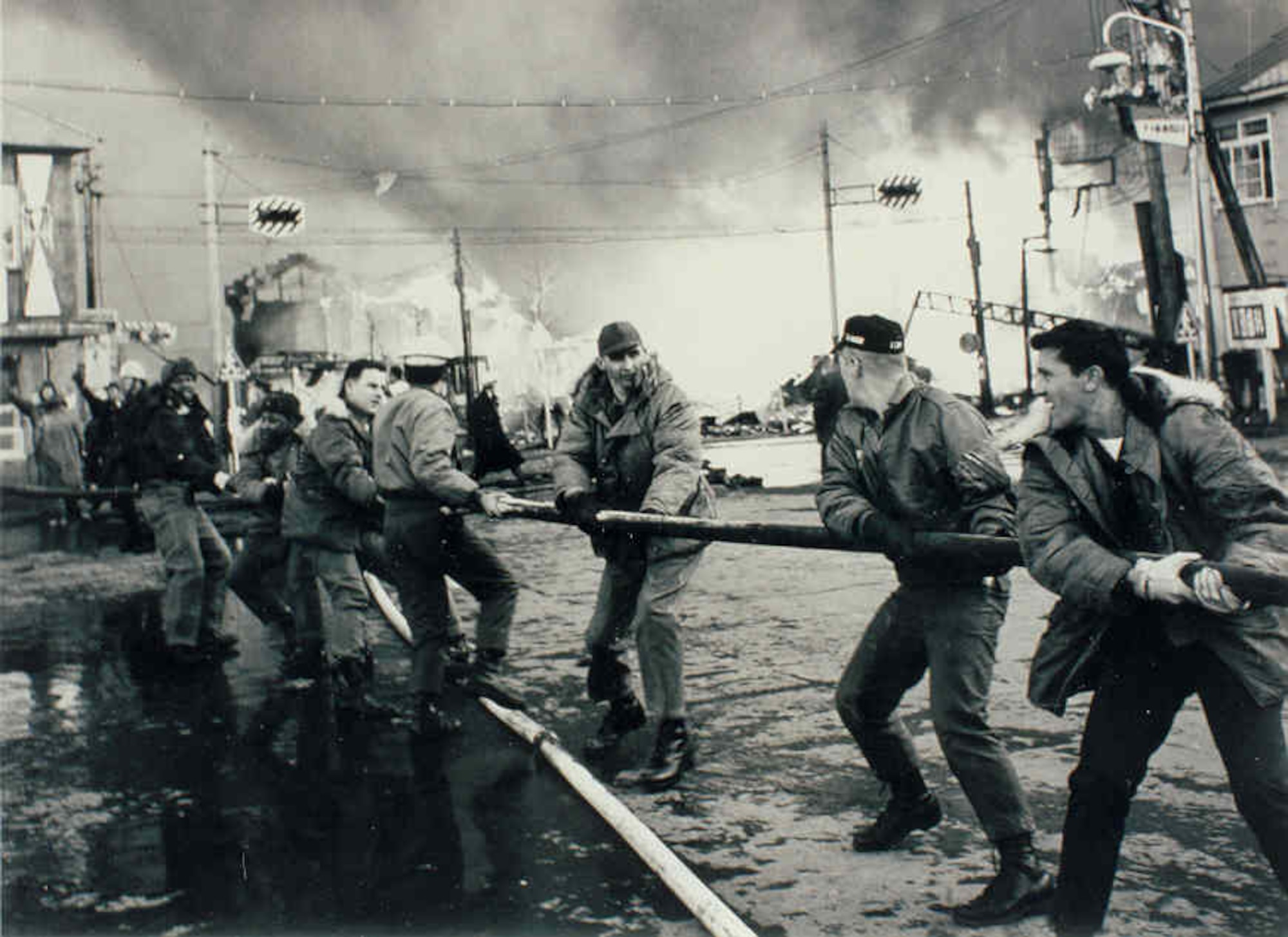 Misawa Airmen respond to a major fire in Misawa City on January 11, 1966.