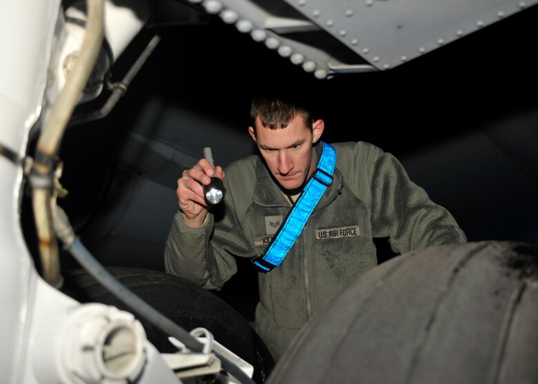 Senior Airman Joshua Kearney, 92nd Aircraft Maintenance Squadron crew chief, inspects the brake system of a KC-135 Stratotanker Jan. 12, 2015, at Fairchild Air Force Base, Wash. Part of the job as a crew chief is to fully inspect the aircraft for any maintenance problems. Kearney’s leadership team selected him as one of Fairchild’s Finest. (U.S. Air Force photo/Airman 1st Class Taylor Bourgeous)