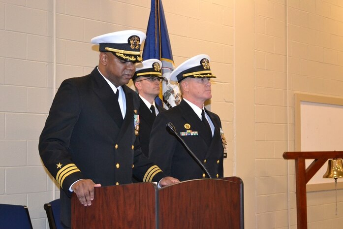 Commander Stephen Jones (left) assumed command of Navy Operational Support Center from CDR Shaun Murphy (right), Jan. 10, 2015 at Joint Base Charleston - Weapons Station. Jones' previous assignment was at U.S. Special Operations Command, MacDill Air Force Base, Fla., and Jones will become the deputy director of Legislative Affairs with the Chief of Navy Reserve at the Pentagon, D.C. (Courtesy Photo)  