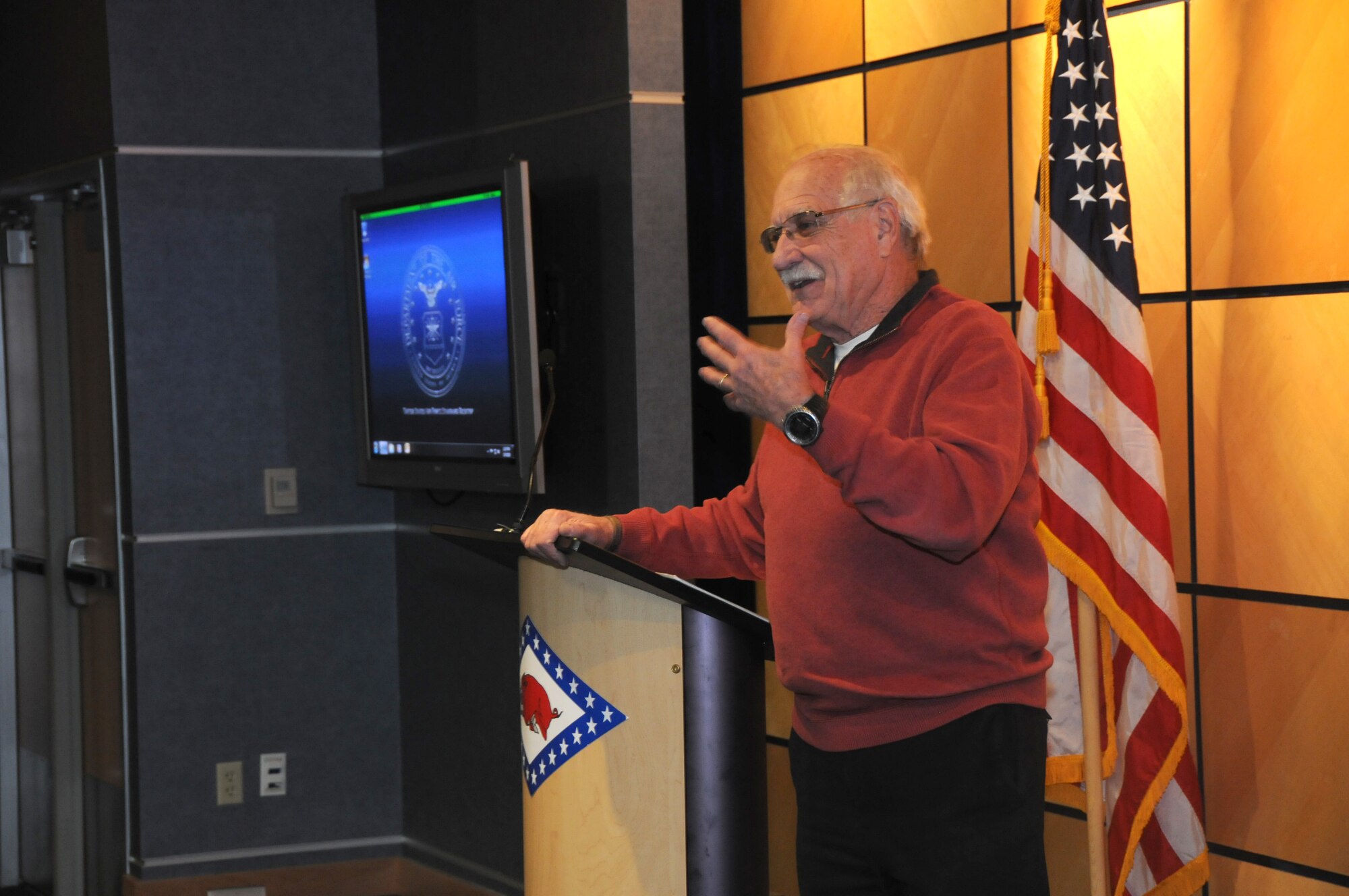 Mr. Larry Brown speaks at Ebbing Air National Guard Base, Fort Smith, Ark., Jan. 9, 2015. Brown spoke to the service members about his son, U.S. Navy SEAL Adam Brown, whose story was made famous in the book "Fearless" by Eric Blehm. The book was written after his son made the ultimate sacrifice in support of Operation Enduring Freedom. (U.S. Air National Guard photo by Airman 1st Class Cody Martin/released)