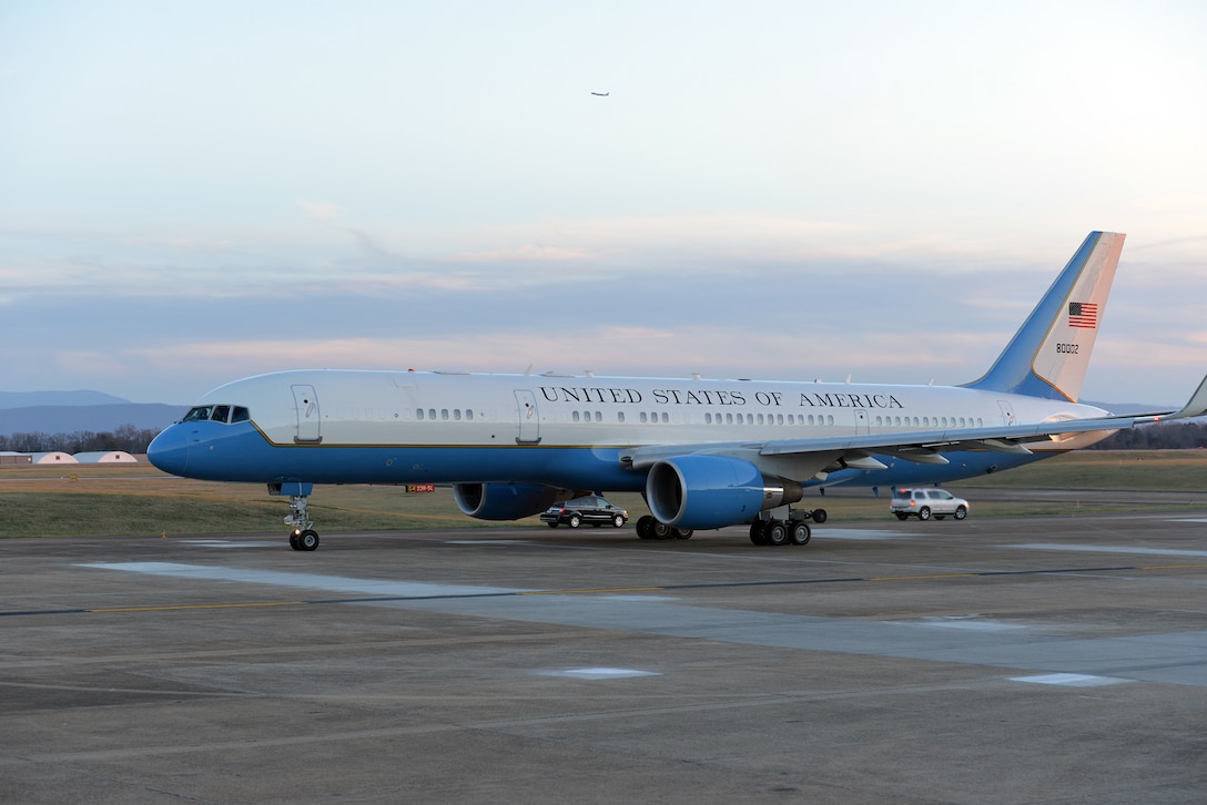 Air Force Two prepares to take off following Air Force One, with Air Force One in the background, from McGhee Tyson ANG Base, Tennessee on Jan. 9.  Vice President Joe Biden was in Knoxville to accompany President Barack Obama as he gave a speech from Pellissippi State Community College to announce a new education initiative. (U.S. Air National Guard photo by Master Sgt. Kendra M. Owenby, 134 ARW Public Affairs)