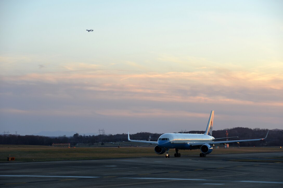 Air Force Two prepares to take off following Air Force One, with Air Force One in the background, from McGhee Tyson ANG Base, Tennessee on Jan. 9.  Vice President Joe Biden was in Knoxville to accompany President Barack Obama as he gave a speech from Pellissippi State Community College to announce a new education initiative. (U.S. Air National Guard photo by Master Sgt. Kendra M. Owenby, 134 ARW Public Affairs)