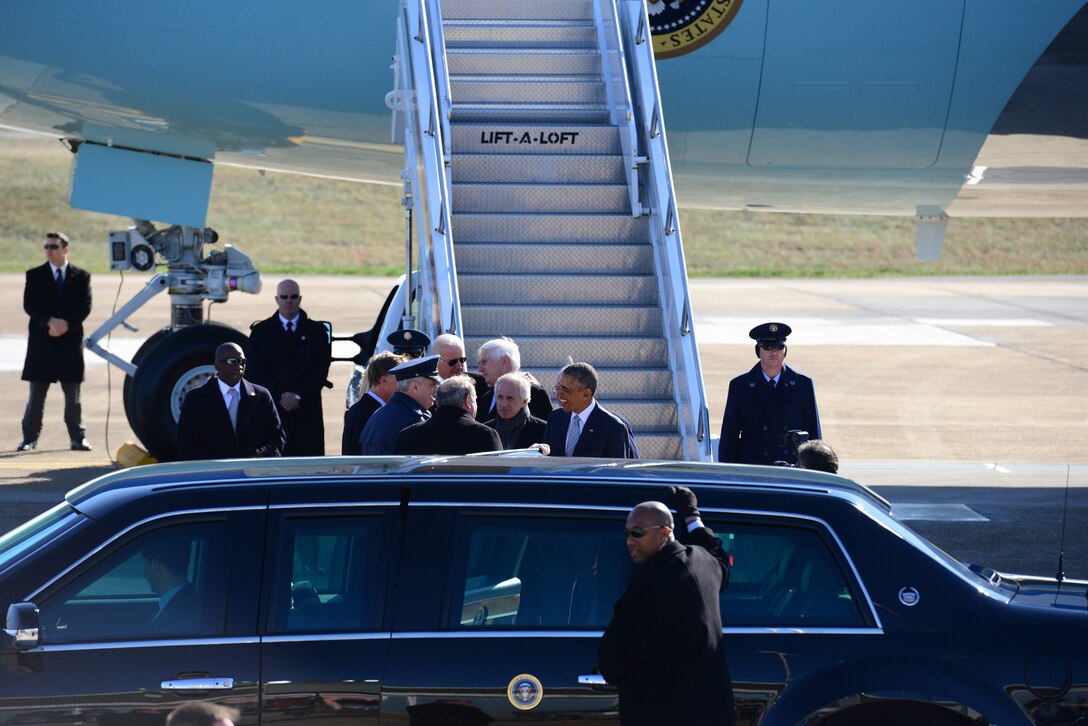 President Barack Obama, accompanied by Senators Lamar Alexander and Bob Corker, and Congressman Jim Duncan, are greeted by Vice President Joe Biden, Tennessee Governor Bill Haslam, Knoxville Mayor Madeline Rogero and 134th Air Refueling Wing Commander Thomas Cauthen as they exit Air Force One at McGhee Tyson ANG Base, Tennessee Jan. 9.  The president visited Pellissippi State Community College in Knoxville to announce a new education initiative. (U.S. Air National Guard photo by Master Sgt. Kendra M. Owenby, 134 ARW Public Affairs)