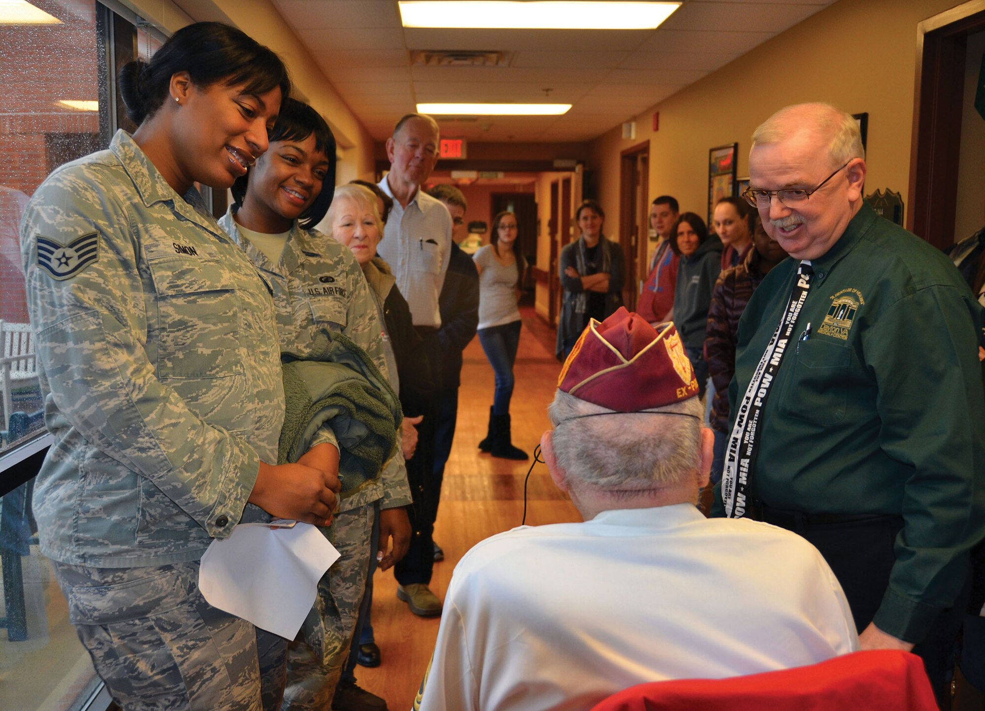 DAYTON, Ohio - 445th Airlift Wing reservists spread holiday cheer to Dayton Veterans Affairs Medical Center Community Living Center residents during their annual visit December 6, 2014. (U.S. Air Force photo/Senior Airman Joel McCullough)