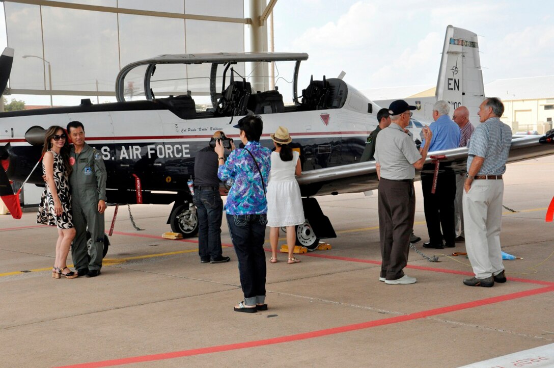 The 88th Flying Training Squadron recently hosted the Vietnam Air Force
Pilots Reunion for 230 former student pilots, instructors and family members
who returned to Sheppard Air Force Base, Texa, after more than four decades.  The Sheppard T-37 pilot training program activated in 1971 and closed in 1974 with the
drawdown of U.S. forces in Vietnam.  The national Vietnam Commemoration
Project encourages bases to conduct three events in a two-year period to
increase awareness of this historical period.  The base Vietnam
Commemoration Committee plans a 2015 Vietnam-era oral history workshop at
the Heritage Center on Feb. 27. (U.S. Photo/Debi Smith)
