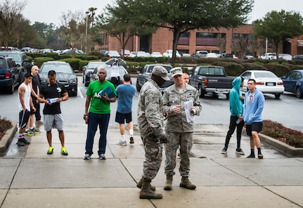 Airmen from the 628th Force Support Squadron evacuated all individuals from the Air Base fitness center during an exercise Jan. 14, 2015, at Joint Base Charleston, S.C. JB Charleston held an exercise Jan. 14 through 15 to test the implementation of Force Protection levels in the event of an on base distrubance. (U.S. Air Force photo/ Senior Airman Dennis Sloan)