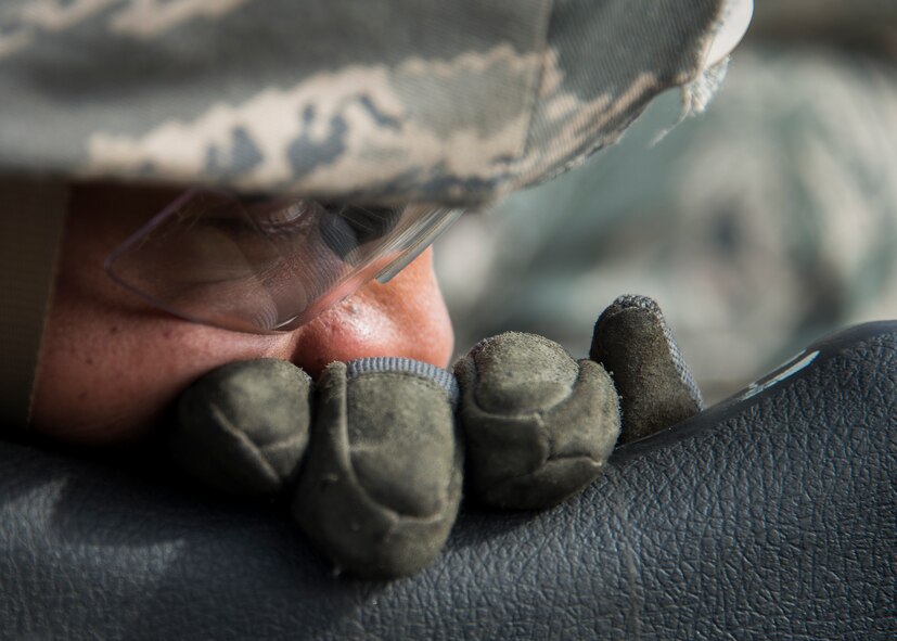 Senior Airman Kendrick Woodson, 919th Special Operations Security Forces Squadron, fires the M240-B during the heavy weapons qualification firing Jan 10, 2015 at Duke Field, Fla.  (U.S. Air Force photo/ Tech. Sgt. Jasmin Taylor)