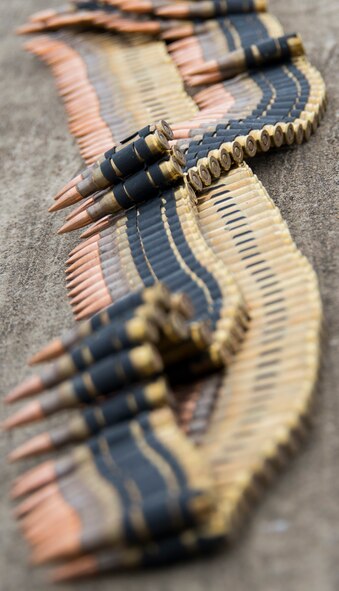 The bullets of a M240-B are laid out for the 919th Special Operations Security Forces Squadron heavy weapons qualification firing Jan 10, at Duke Field, Fla.  (U.S. Air Force photo/ Tech. Sgt. Jasmin Taylor)