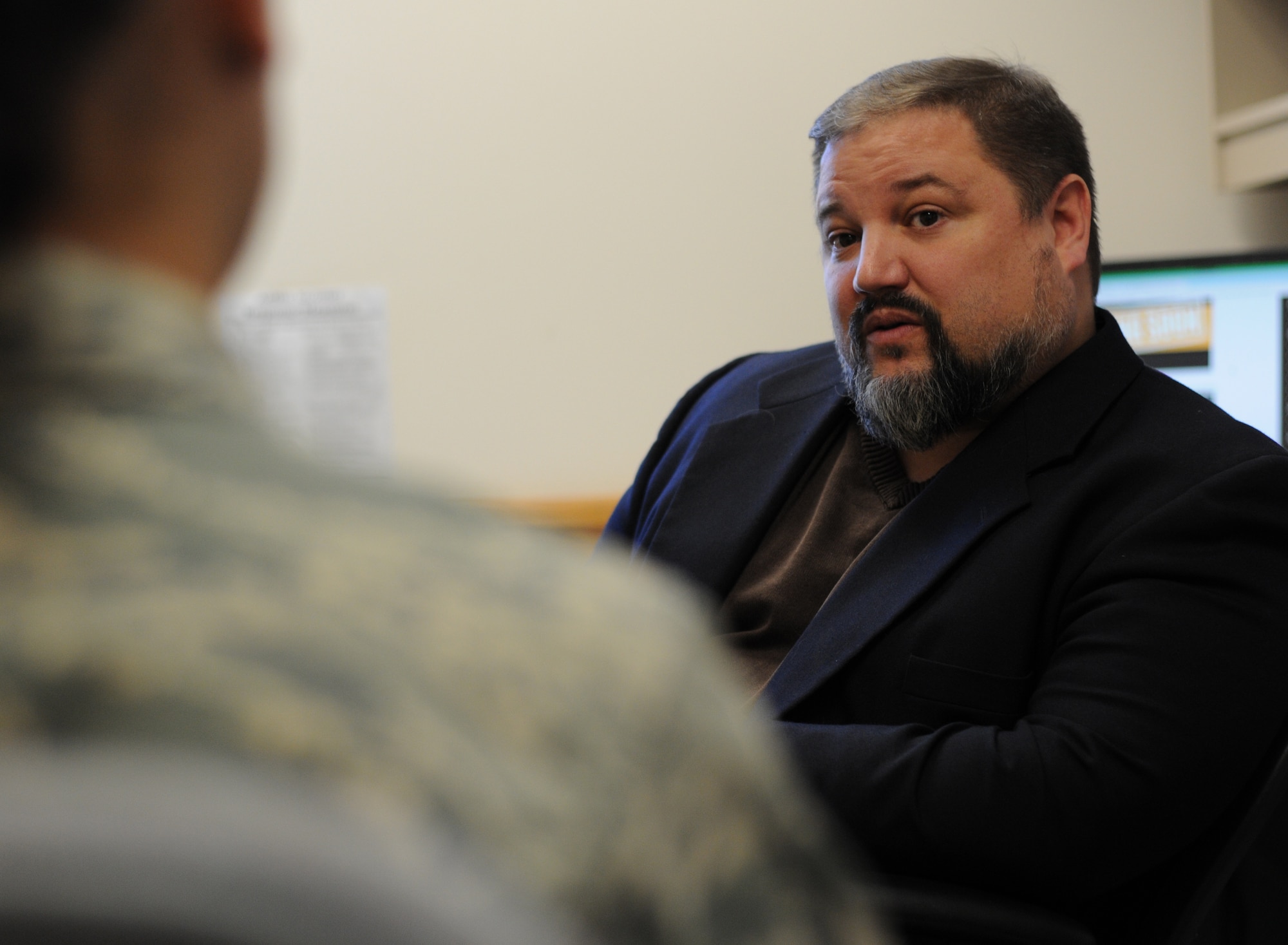 Dan Norton, Director of Psychological Health for the 914th Airlift Wing conducts a counseling session on Jan. 13, 2014 at Niagara Falls Air Reserve Station, N.Y. Norton holds a master's degree in Counseling Psychology and is a licensed clinical social worker. (U.S. Air Force photo by Staff Sgt. Matthew Burke)