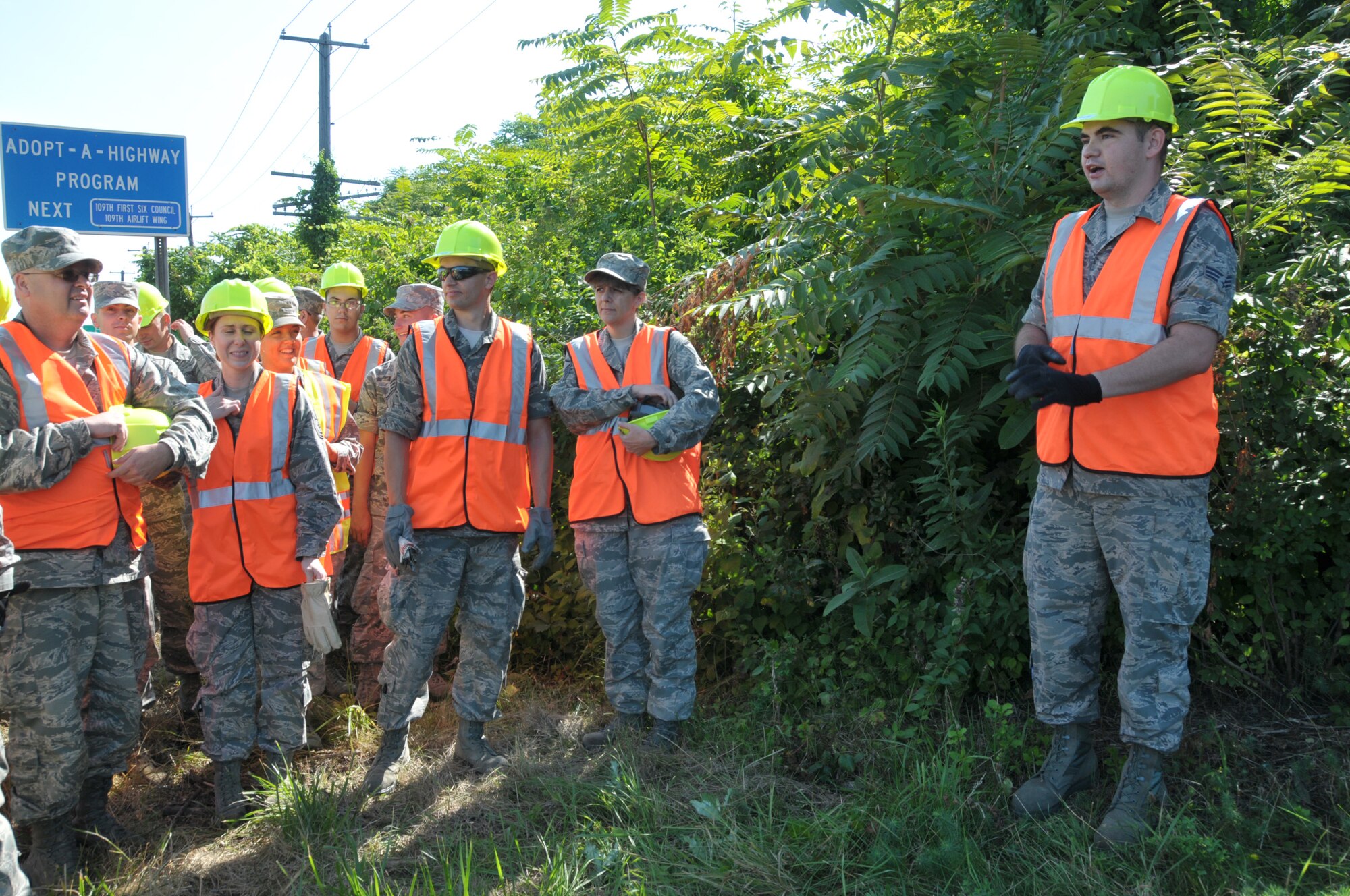 Senior Airman James Comstock, 109th First Six Council president, thanks everyone for coming out for the unit's first Adopt-A-Highway program Aug. 10, 2014,  which he coordinated. Comstock was recently selected as the 2015 New York Air National Guard Airman of the Year. (U.S. Air National Guard photo by Tech. Sgt. Catharine Schmidt/Released)
