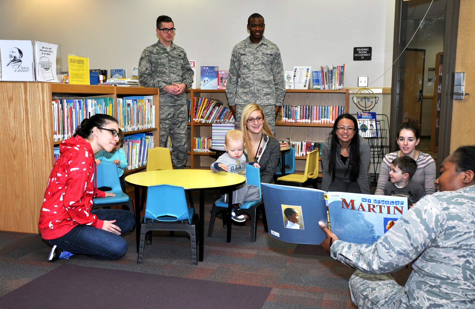GOODFELLOW AIR FORCE BASE, Texas – 2nd Lt. Sonya R. Yelbert, 17th Medical Support Squadron Readiness and Logistics Flight Commander, reads “My Brother Martin” during story time at the Consolidated Learning Center Jan. 13. Christine King Farris wrote the book about her brother Martin Luther King Jr. and retells the story of their childhood. (U.S. Air Force photo/ Senior Airman Joshua Edwards)