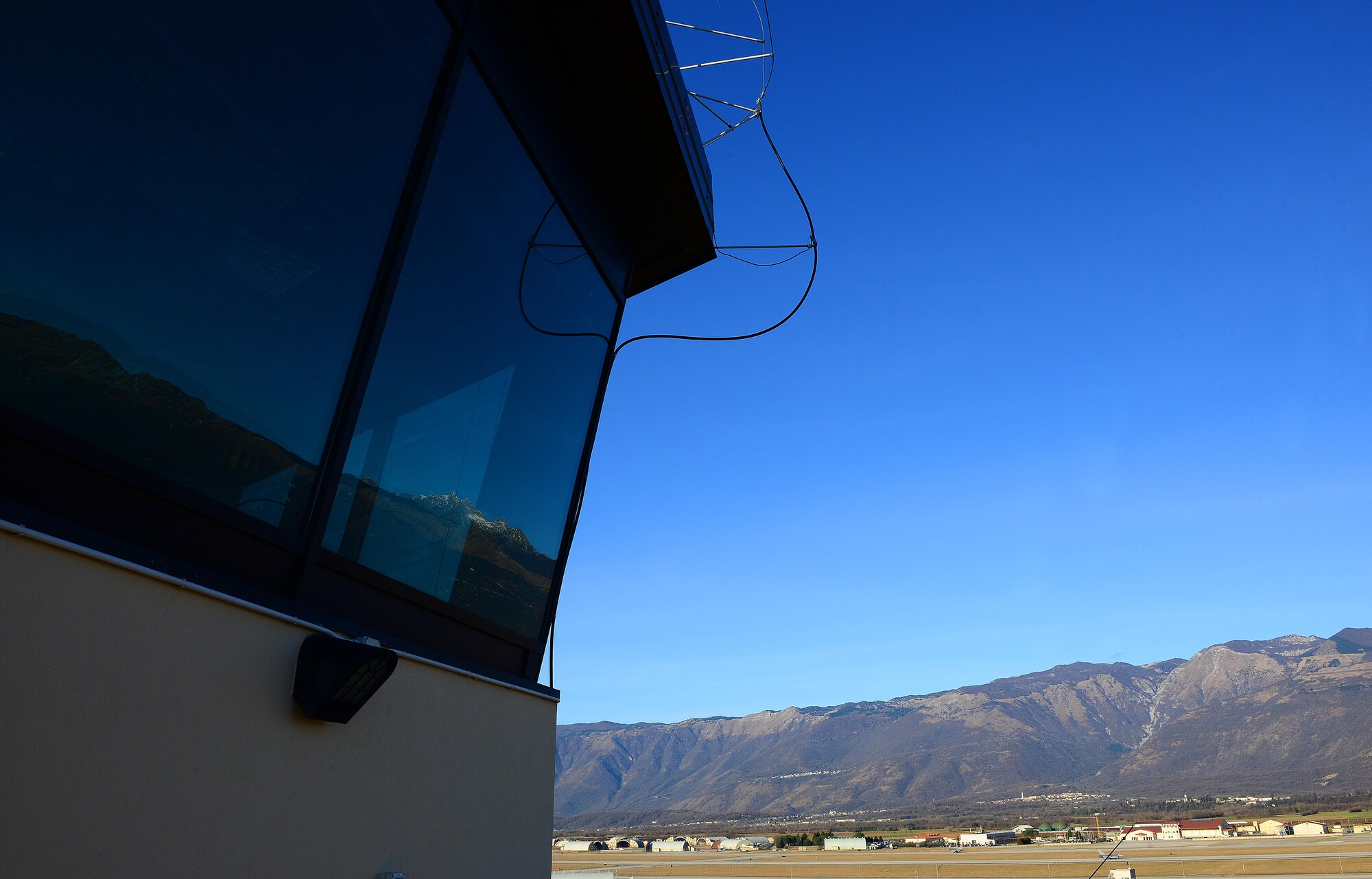 For the safest airfield operations, the 31st Operations Support Squadron air traffic controllers work closely with Italian air force members at Aviano Air Base, Italy. Italian air traffic controllers assist with flying operations by eliminating the language disconnect between the U.S. controllers and  Italian control towers. (U.S. Air Force photo/Senior Airman Matthew Lotz)