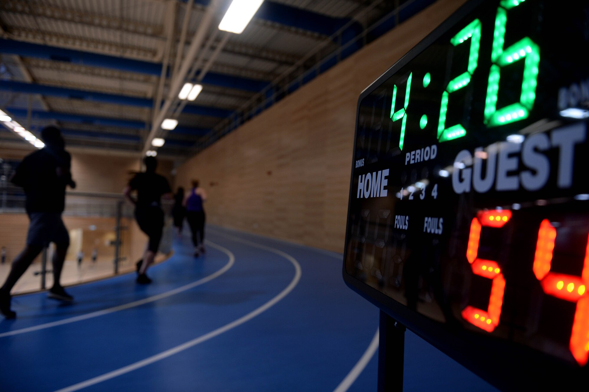 The 52nd Fighter Wing community members participate in a timed run during the Turbo-Charged Challenge #1 at the Eifel Powerhaus at Spangdahlem Air Base, Germany, Jan. 13, 2015. The challenge is a 10-lap, timed run, which is part of the Largest Loser campaign that started Jan. 5. (U.S. Air Force photo by Airman 1st Class Timothy Kim/Released)
