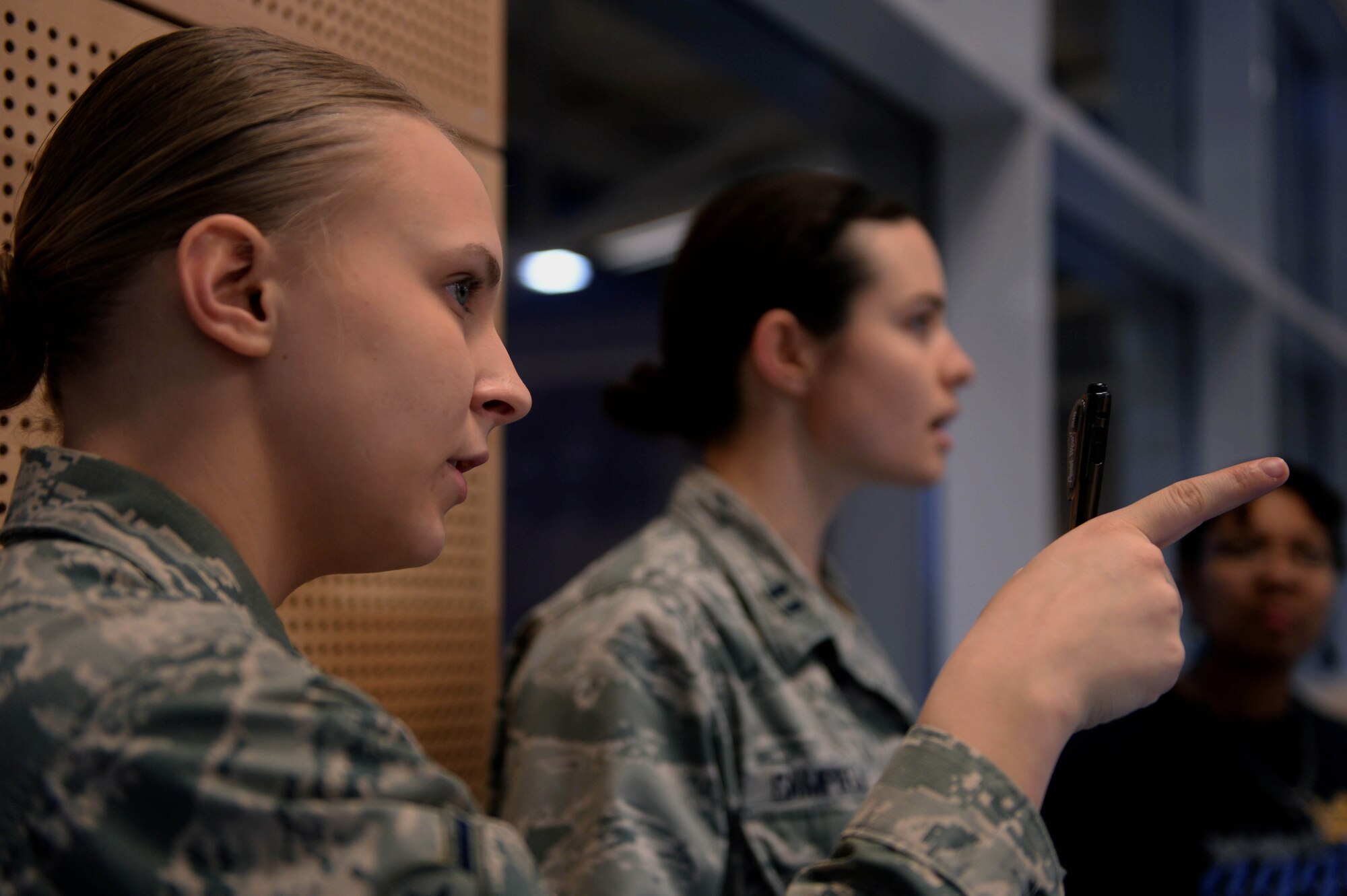 U.S. Air Force Airman Kimberly Collins, 52nd Force Support Squadron fitness apprentice and native of Morris, Ala., left, and U.S. Air Force Capt. Denise Campbell, 52nd Aerospace Medicine Squadron health promotion dietitian and native of Downingtown, Pa., right, oversee the Turbo-Charged Challenge #1 at the Eifel Powerhaus at Spangdahlem Air Base, Germany, Jan. 13, 2015. The 52nd Aerospace Medicine Squadron and fitness center collaborated on the Largest Loser campaign to promote physical fitness and proper nutrition habits. (U.S. Air Force photo by Airman 1st Class Timothy Kim/Released)