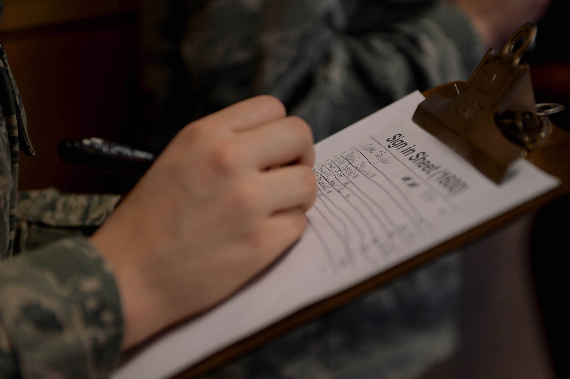 U.S. Air Force Airman Kimberly Collins, 52nd Force Support Squadron fitness apprentice and native of Morris, Ala., logs participants’ laps during the Turbo-Charged Challenge #1 at the Eifel Powerhaus at Spangdahlem Air Base, Germany, Jan. 13, 2015. Collins planned and organized the event which assessed individuals on whether or not they could run 10 laps within 10 minutes at the indoor track. (U.S. Air Force photo by Airman 1st Class Timothy Kim/Released)