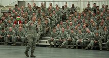 Col. James M. Phillips, commander of the 919th Special Operations Wing, addresses the Airmen the annual commander’s call Dec. 7, at Duke Field Fla.  He briefed on safety, sexual assault prevention and took questions from the audience.  (U.S. Air Force photo by Tech. Sgt. Jasmin Taylor)