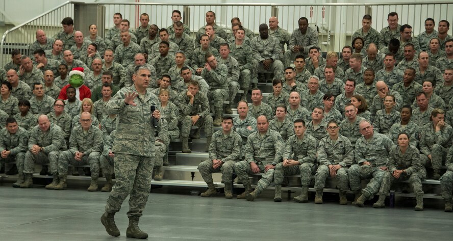 Col. James M. Phillips, commander of the 919th Special Operations Wing, addresses the Airmen the annual commander’s call Dec. 7, at Duke Field Fla.  He briefed on safety, sexual assault prevention and took questions from the audience.  (U.S. Air Force photo by Tech. Sgt. Jasmin Taylor)