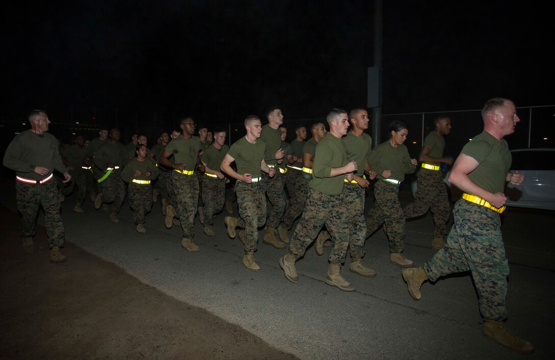 Marines from units across Marine Aircraft Group 13 set out on a morning run during the MAG-13 University Lance Corporal Leadership and Ethics Seminar course aboard Marine Corps Air Station Yuma, Ariz., Tuesday, Jan. 13, 2015. The Marines were selected to attend the week-long seminar from Jan. 12-16 to develop and prepare them for future leadership challenges.
