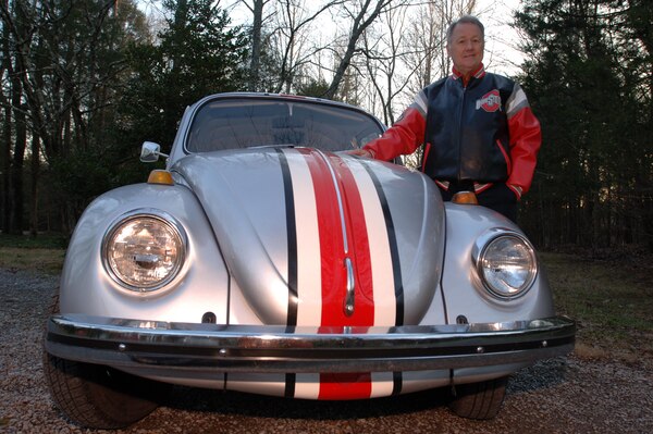 Jeff Linkinhoker, project manager in the U.S. Army Corps of Engineers Nashville District, poses Jan. 14, 2015 with his 1968 vintage Volkswagen Beetle that he restored in 2011 and painted to look like an Ohio State University football helmet.  A huge Buckeyes fan, he was featured Jan. 8, 2015 by ABC Channel 6 from Columbus, Ohio in their “Drive to the Championship” report as they passed through Nashville, Tenn., on their way to college football’s national championship game.