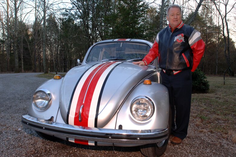 Jeff Linkinhoker, project manager in the U.S. Army Corps of Engineers Nashville District, poses Jan. 14, 2015 with his 1968 vintage Volkswagen Beetle that he restored in 2011 and painted to look like an Ohio State University football helmet.  A huge Buckeyes fan, he was featured Jan. 8, 2015 by ABC Channel 6 from Columbus, Ohio in their “Drive to the Championship” report as they passed through Nashville, Tenn., on their way to college football’s national championship game.