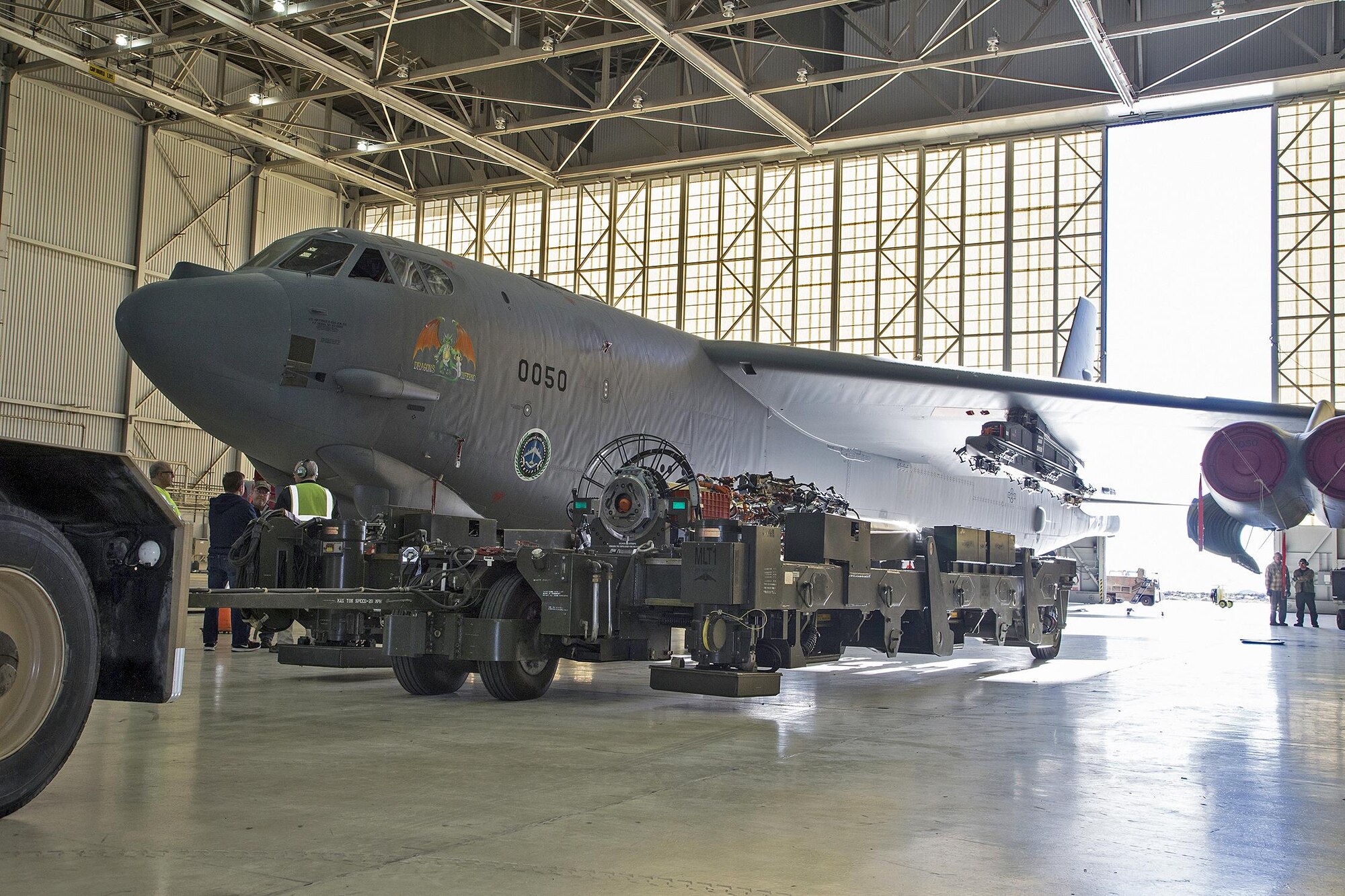 Team members from the 419th Flight Test Squadron, the Global Power Bomber Combined Test Force and Boeing installed a Conventional Rotary Launcher (CRL) December 2014, on a B-52H Stratofortress from Edwards Air Force Base, Calif. The upgrade modifies the internal weapons bay of the B-52H by integrating a CRL that has the capability of carrying Military Standard 1760 “smart weapons.” (U.S. Air Force photo/Bobbi Zapka)