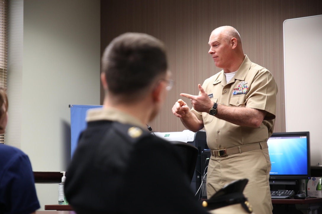 Master Chief Petty Officer Dino Medler, the 13th senior enlisted leader for the religious program specialist rating, addresses Sailors and Navy recruits Jan. 14, 2014 at the Naval Air Station Joint Reserve Base New Orleans Military Entrance Processing Center. Medler visited with Sailors at Marine Forces Reserve and NASJRB New Orleans to celebrate the 36th anniversary of the creation of the religious program specialist rating, which was created Jan. 15, 1979. The religious program specialists at Marine Forces Reserve provide administrative and clerical support to Navy chaplains in developing programs to meet the mental and spiritual needs of Sailors and Marines throughout the Reserve Force. (U.S. Marine Corps photo by Cpl. Tiffany Edwards)