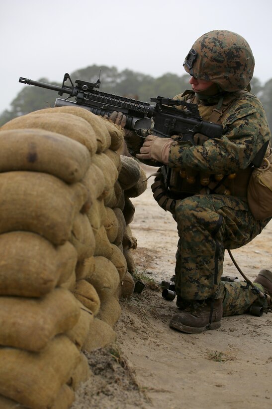 Sgt. Radmila M. Allen, team leader with 3rd Platoon, Company A, Ground Combat Element Integrated Task Force, fires the M203 grenade launcher during a live-fire range at the Verona Loop training area, near Marine Corps Base Camp Lejeune, North Carolina, Jan. 14, 2015. Marines with Co. A conducted live-fire training, squad attacks, and patrolling in preparation for their upcoming assessment at Marine Corps Air Ground Combat Center Twentynine Palms, California. From October 2014 to July 2015, the GCEITF will conduct individual and collective level skills training in designated ground combat arms occupational specialties in order to facilitate the standards based assessment of the physical performance of Marines in a simulated operating environment performing specific ground combat arms tasks. (U.S. Marine Corps photo by Sgt. Alicia R. Leaders/Released)
