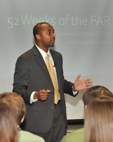 Jamaya "Rocky" Smith, a contract specialist for Huntsville Center’s Information Technology Services Branch, talks to employees during the Jan. 12 Federal Acquisition Regulation lunch and learn program about the importance of understanding and clarifying definitions of contracting words and terms to avoid confusion.