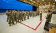 Airmen from the 901st Special Operations Maintenance Squadron form up for roll call and a briefing before conducting a Foreign Object Damage prevention walk on the flightline at Hurlburt Field, Fla., Jan. 12, 2015. FOD walks decrease the chances of aircraft being damage by debris. (U.S. Air Force photo/Senior Airman Krystal M. Garrett)