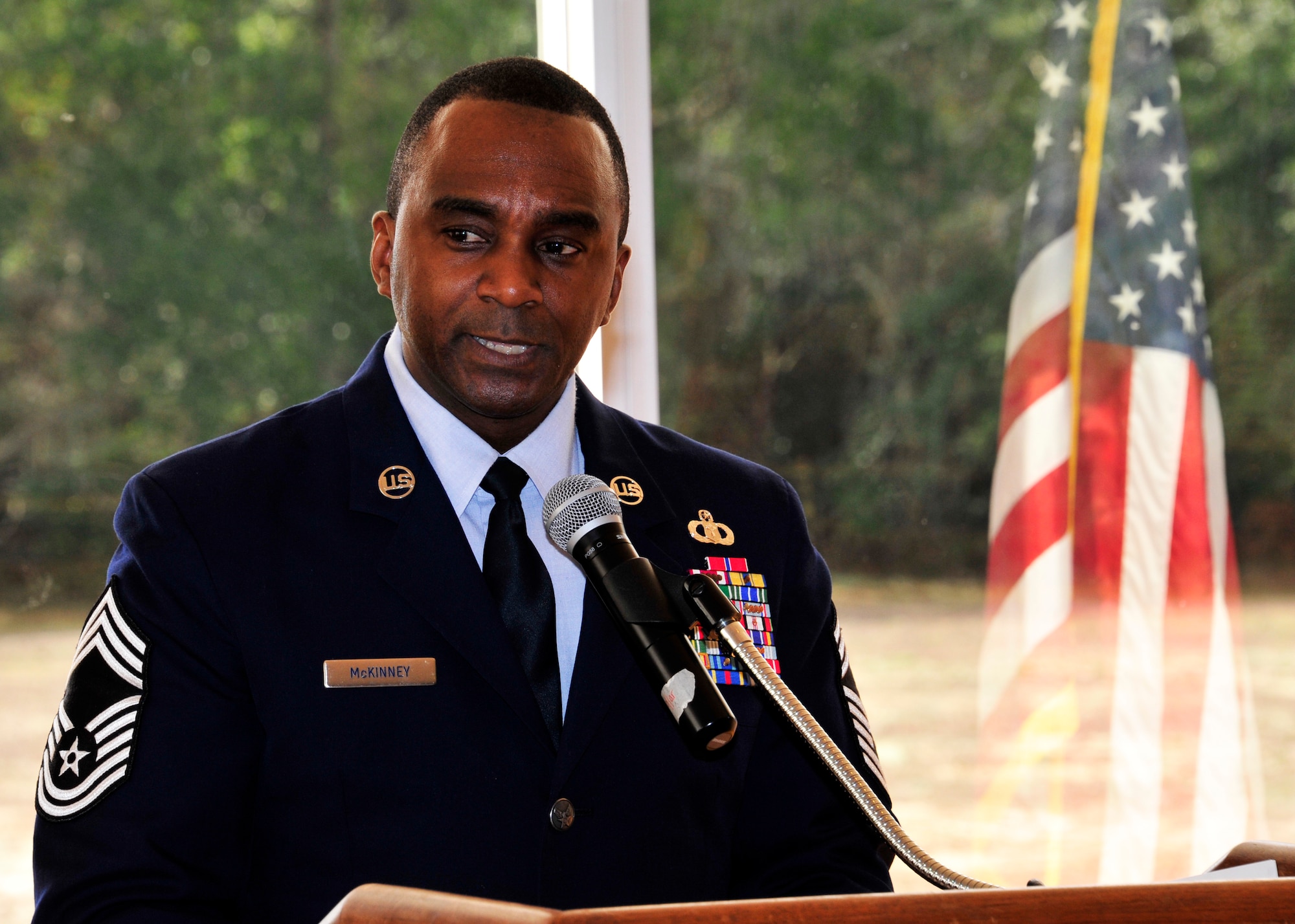 Chief Master Sgt. Chris McKinney, superintendent of the 33rd Operations Group, 33rd Fighter Wing, speaks to attendees during the Martin Luther King, Jr. Day Luncheon at Eglin’s Bayview Club, Jan. 14. Eglin’s Equal Opportunity office and volunteers facilitated the annual base event to honor the national MLK Day of service. (U.S. Air Force photo/Ilka Cole)  