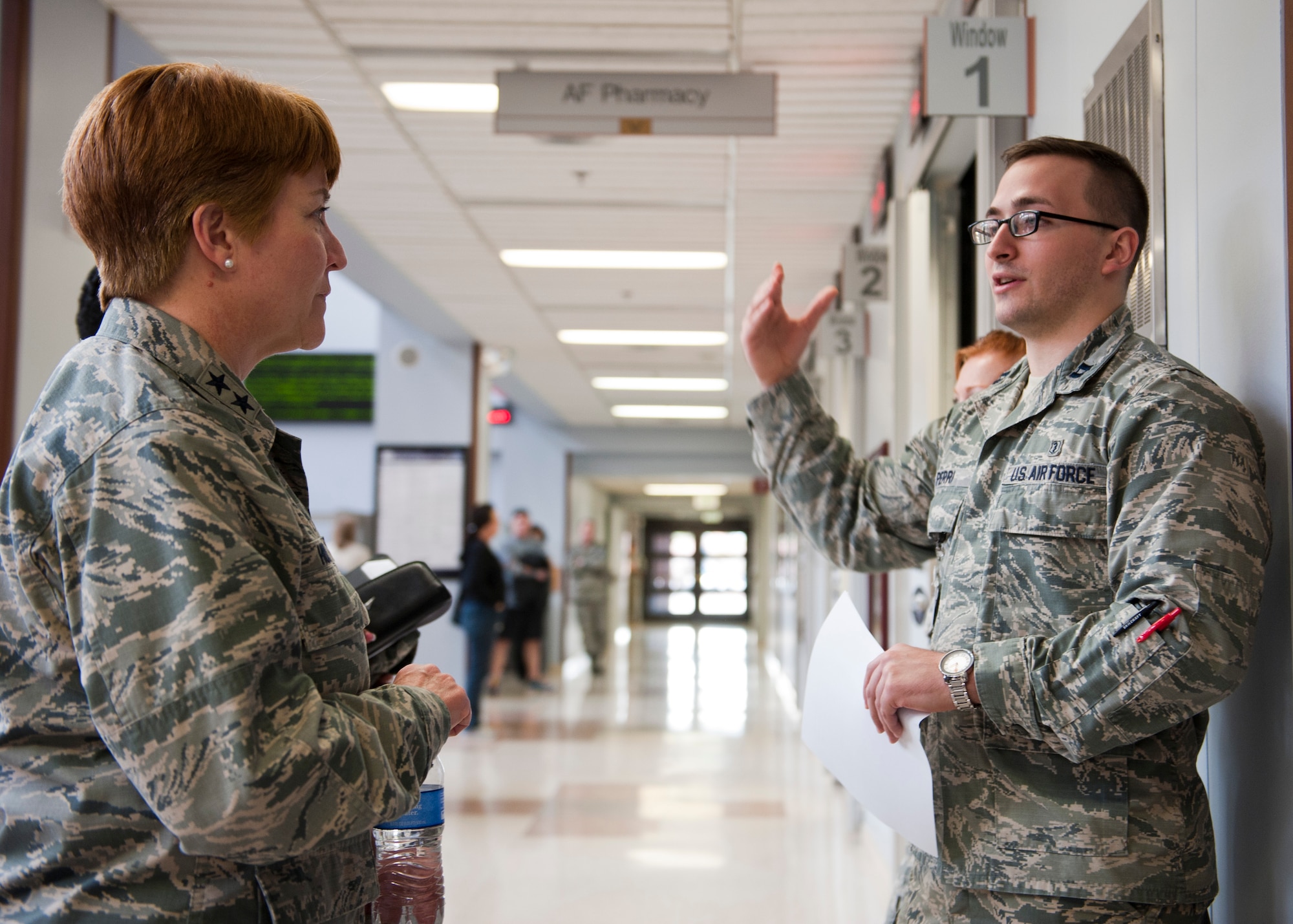 Capt. Victor Perri (right), 99th Medical Support Squadron pharmacist, briefs Maj. Gen. Dorothy Hogg, U.S. Air Force director of medical operations and research and chief of the nurse corps, on the operations of the pharmacy at the Mike O’Callaghan Federal Medical Center, Nellis Air Force Base, Nev., Jan. 13, 2015. Hogg was visiting Nellis and the nearby University Medical Center of Southern Nevada to discuss the benefits of the Sustained Medical and Readiness Trained, or SMART, program. (U.S. Air Force photo by Senior Airman Thomas Spangler) 