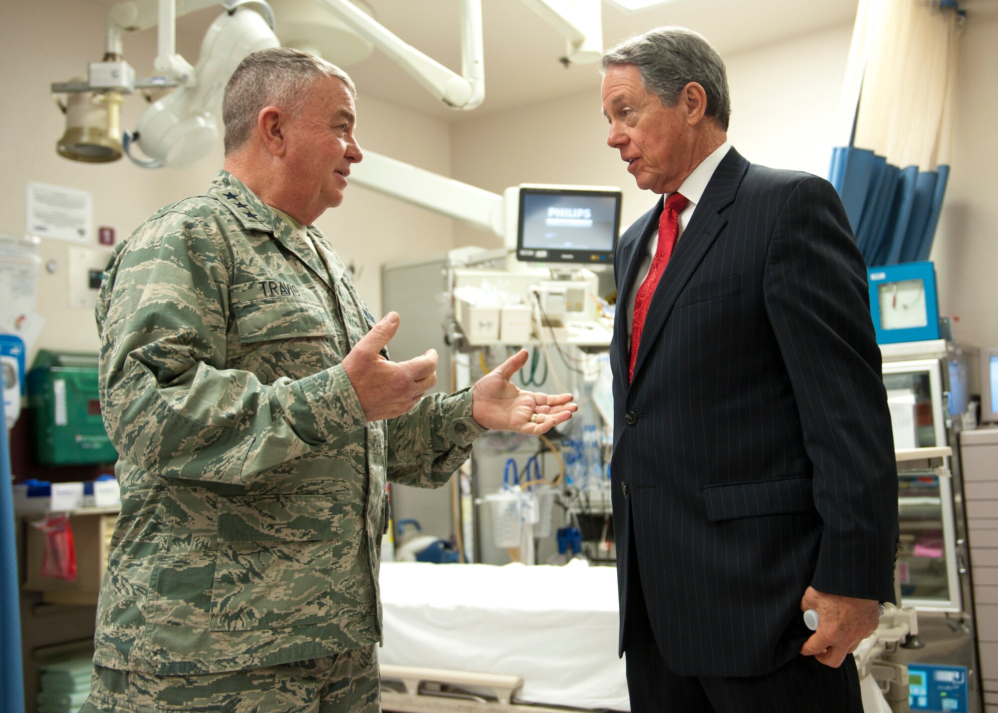 Lt. Gen. Thomas Travis, U.S. Air Force surgeon general, discusses the Sustained Medical and Readiness Trained, or SMART, program with John O’Reilly, University Medical Center of Southern Nevada chairman of the board, in the hospital’s emergency room, Las Vegas, Nev., Jan. 13, 2015. The SMART program allows Air Force physicians, nurses and medical technicians the opportunity to hone their skills in a civilian hospital where they have the potential to see more trauma patients than they would in a military treatment facility. (U.S. Air Force photo by Senior Airman Thomas Spangler)