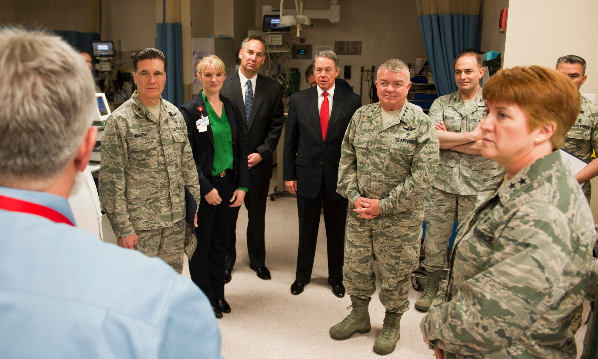Brig. Gen. Sean Murphy (far left), Air Combat Command command surgeon, Lt. Gen. Thomas Travis (center), U.S. Air Force surgeon general and Maj. Gen. Dorothy Hogg (far right), U.S. Air Force director of medical operations and research and chief of the nurse corps, listen to an overview of the University Medical Center of Southern Nevada emergency room during a tour of the hospital in Las Vegas, Nev., Jan. 13, 2015. Travis, Hogg and Murphy were visiting UMC to learn about the benefits of the Sustained Medical and Readiness Trained, or SMART, program. The program is designed to give physicians, nurses and medical technicians the opportunity that they would not receive in a Military Treatment Facility to refine their skills. (U.S. Air Force photo by Senior Airman Thomas Spangler)