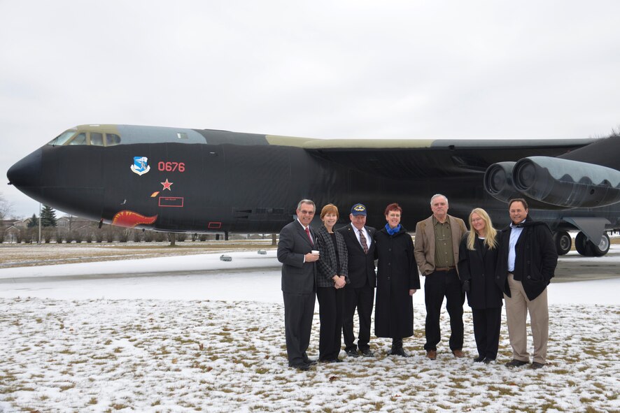 Family members and friends of fallen Airmen, Capt. David Lyon, pose in front of a B-52 Stratofortress Jan. 14, 2015, at Heritage Park on Fairchild Air Force Base, Wash. Air Force officials conducted the official naming ceremony of Motor Vessel Capt. David I. Lyon Jan. 14, at the Pentagon. Lyon is a native of Sandpoint, Idaho. Fairchild Airmen hosted his family and friends from Sandpoint to view the ceremony via video teleconference from the base. (U.S. Air Force photo/Senior Airman Janelle Patino)