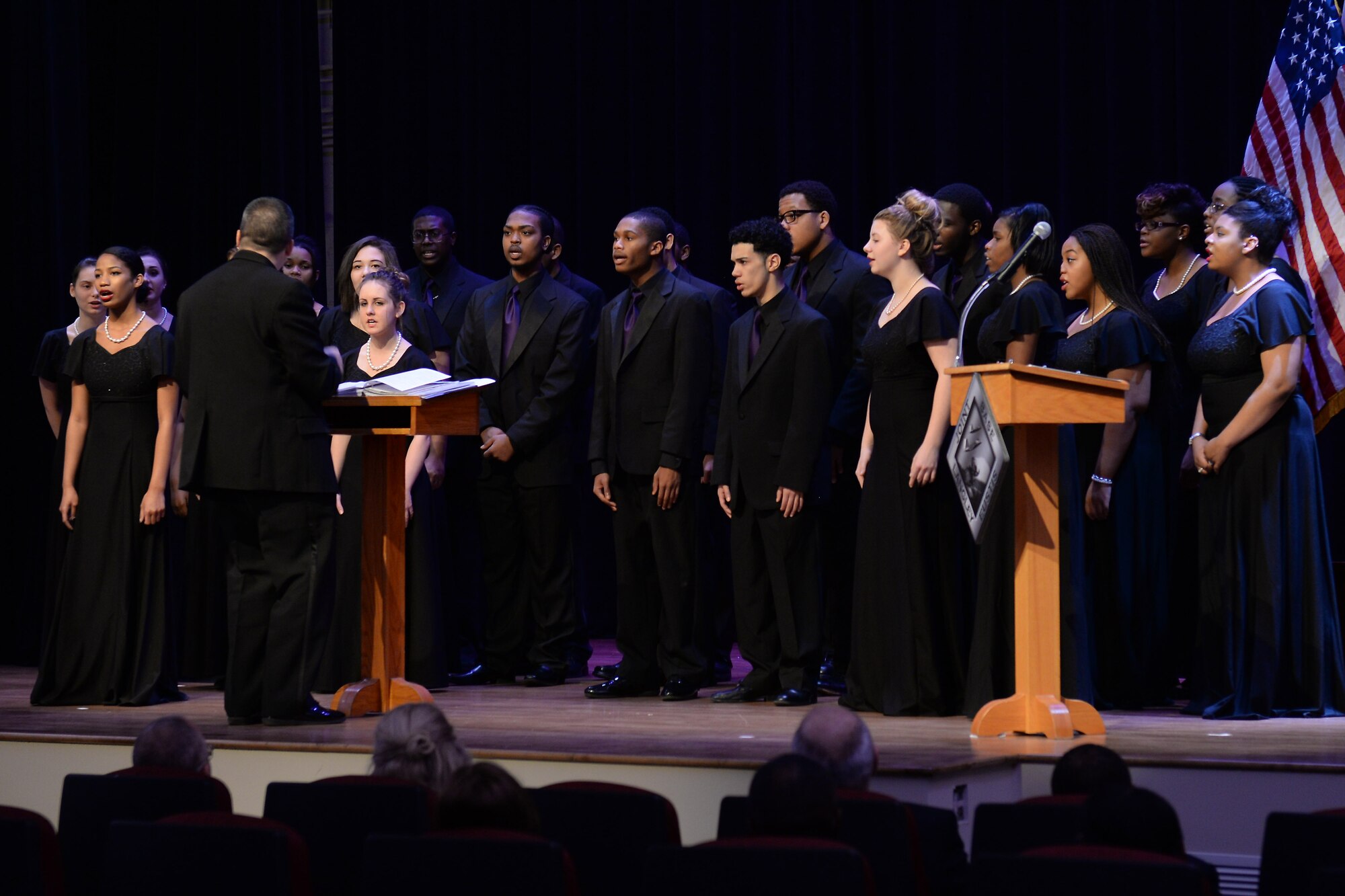 Members of the Woodside High School Jubilee Chorale sing during a Martin Luther King, Jr. memorial ceremony at Fort Eustis, Va., Jan. 13, 2015. According to the choir director, Emilio Pesante, the songs reflected messages that encompassed Dr. King’s philosophies on volunteerism. (U.S. Air Force photo by Staff Sgt. Teresa J. Cleveland/Released)