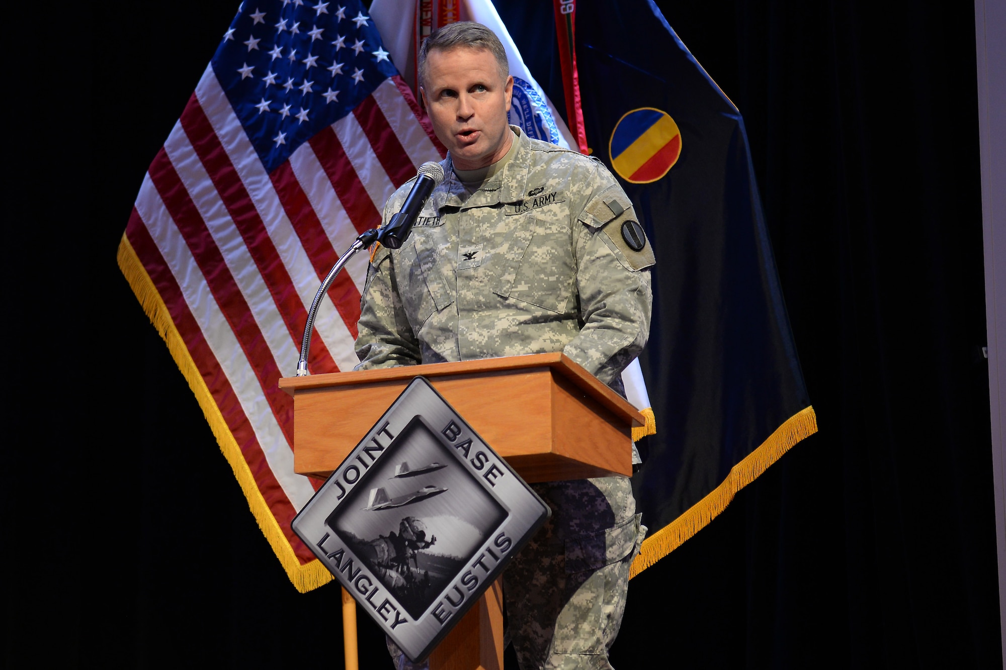 U.S. Army Col. Richard Montieth, Training and Doctrine Command deputy chief of staff, gives opening remarks during a Martin Luther King, Jr. memorial ceremony at Fort Eustis, Va., Jan. 13, 2015. The theme of the event was “A day on, not a day off,” emphasizing the importance of always striving toward success and giving toward others. (U.S. Air Force photo by Staff Sgt. Teresa J. Cleveland/Released)