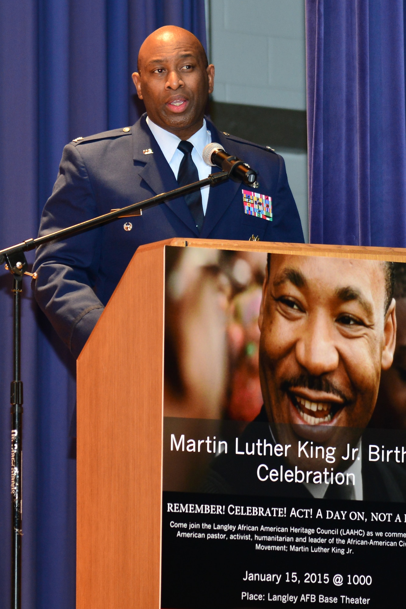 U.S. Air Force Col. Rickey Rodgers, Air Combat Command deputy inspector general, speaks to a crowd during an event celebrating Rev. Dr. Martin Luther King, Jr. at Langley Air Force Base, Va., Jan. 15, 2015. Rodgers spoke of the affect King’s legacy had on the integration of African Americans as well as female pilots in the Air Force. (U.S. Air Force photo by Senior Airman Aubrey White/Released) 
