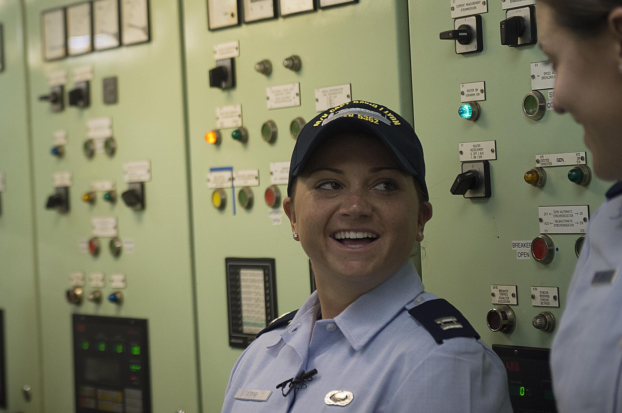 Capt. Dana M. Lyon, widow of Capt. David I. Lyon, talks with 2nd Lt. Alana Piccone during a tour of the Motor Vessel Capt. David I. Lyon, Aug. 11, 2014, at Military Ocean Terminal Sunny Point in Southport, N.C. The MV Capt. David I. Lyon is an Air Force prepositioning vessel named in honor of Capt. David I. Lyon, an Air Force logistics readiness officer and 2008 U.S. Air Force Academy graduate who was killed in action Dec. 27, 2013, in Afghanistan. The vessel will transport critical war reserve materiel to locations around the globe. (U.S. Air Force photo/Tech. Sgt. Jason Robertson)