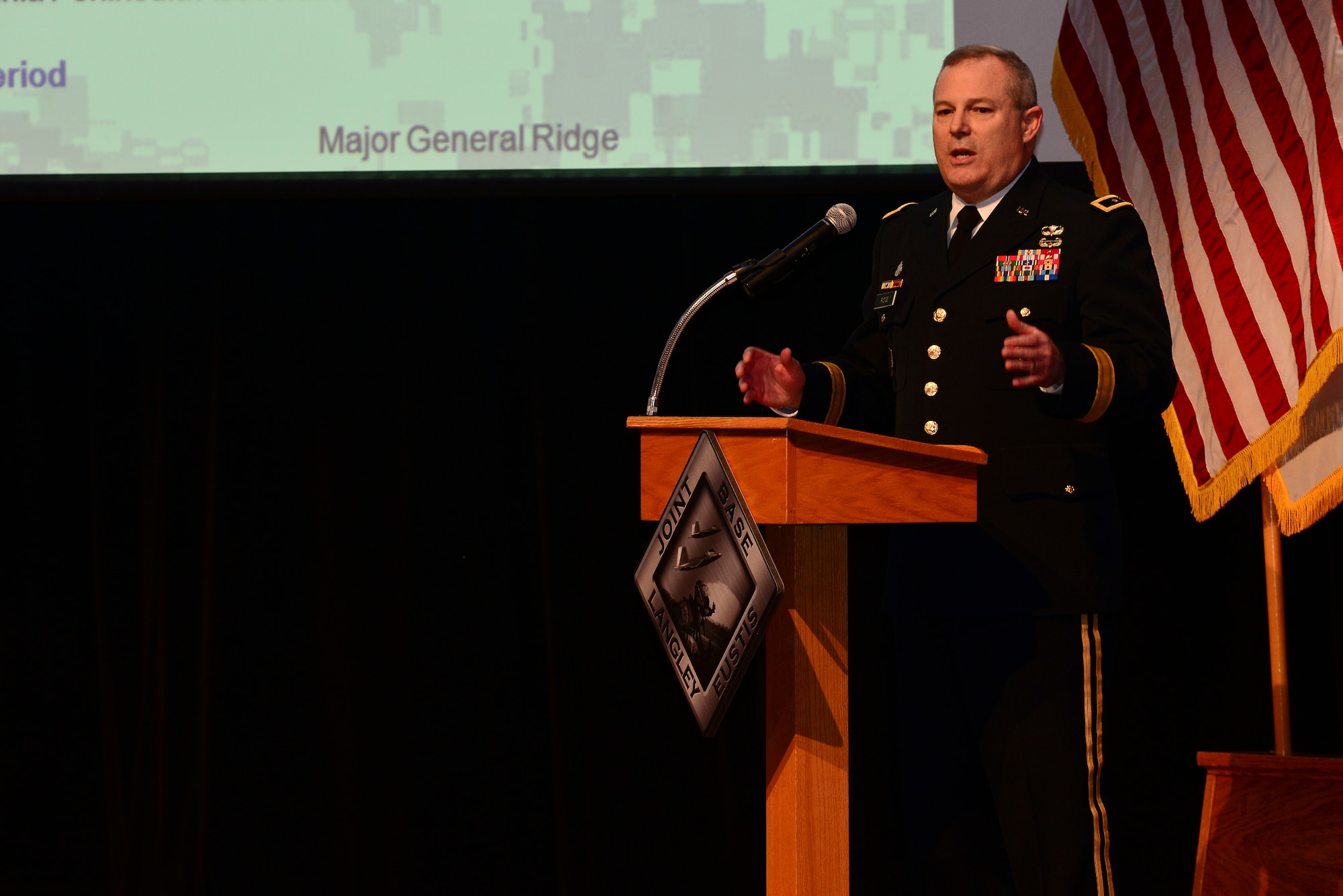 U.S. Army Maj. Gen. Ross E. Ridge, Initial Military Training Center, Training and Doctrine Command deputy commanding general, speaks during a Community Listening Session at Fort Eustis, Va., Jan. 13, 2015. The session was held to discuss proposed U.S. Army force reductions and restructuring with local leadership, Eustis workforce and elected officials. (U.S. Air Force photo by Senior Airman Kimberly Nagle/Released)