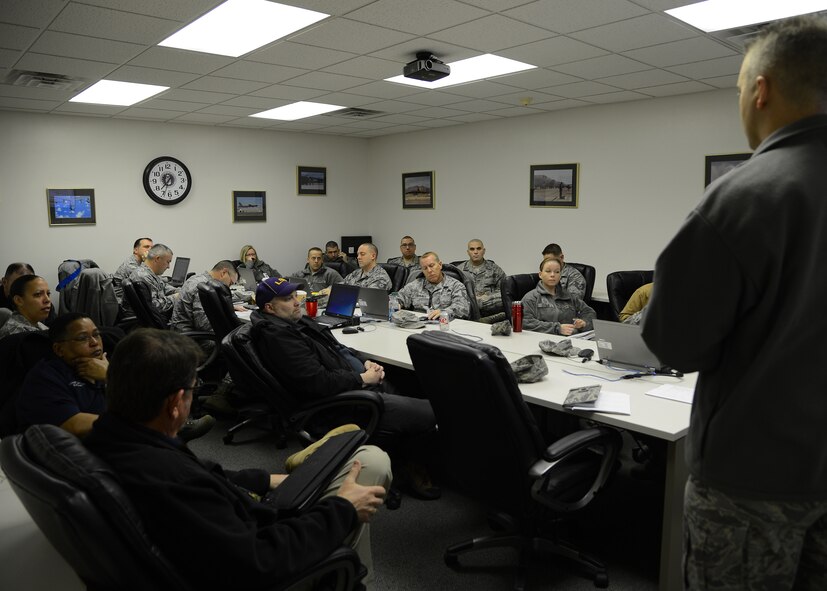 Lt. Col. Charles Bailey, 2nd Bomb Wing inspector general, briefs members of the 2nd BW Inspection Team prior to the start of the 2nd Logistics Readiness Squadron IG inspection on Barksdale Air Force Base, La., Jan. 13, 2015. The 2nd LRS underwent an inspection this week to maintain operations at maximum efficiency and better the quality of life in its workplace. (U.S. Air Force photo/Senior Airman Joseph A. Pagán Jr.)