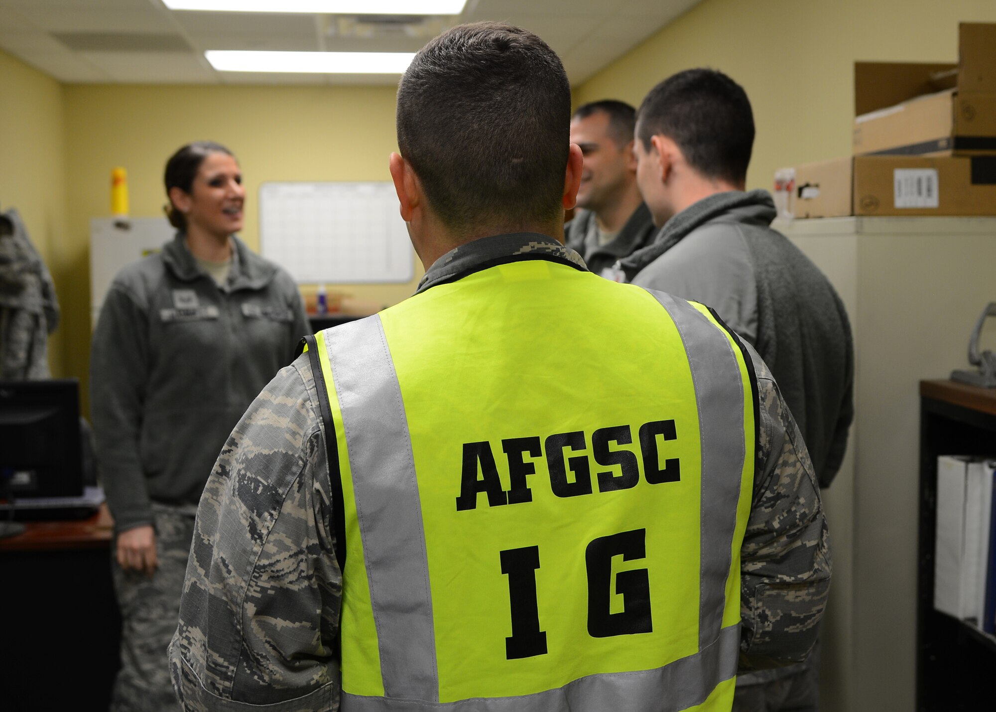 An Air Force Global Strike Command Inspector General team member oversees the 2nd Bomb Wing Inspection Team during an inspection of the 2nd Logistics Readiness Squadron on Barksdale Air Force Base, La., Jan. 12, 2015. The goal of the WIT is to offer the wing commander an impartial assessment on how the squadron is operating and how their processes can be improved in accordance with Air Force regulations. (U.S. Air Force photo/Senior Airman Joseph A. Pagán Jr.)